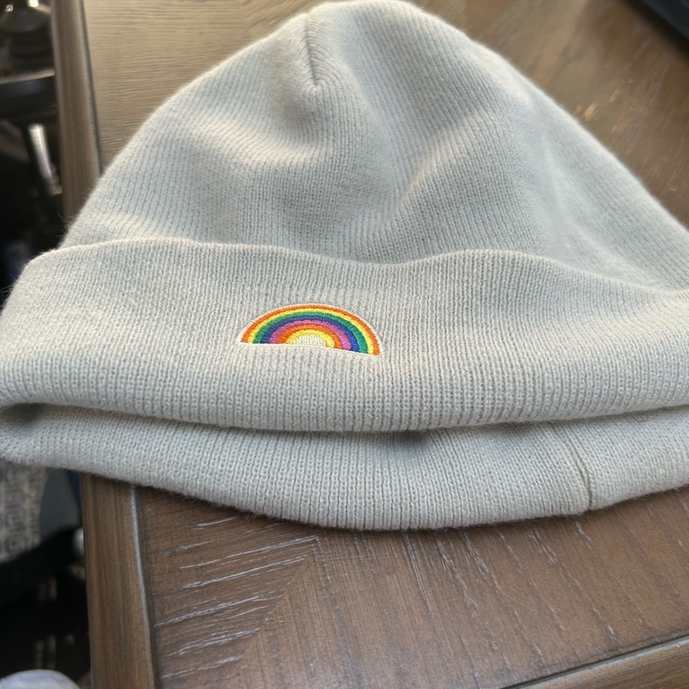 Gray hat beanie, never worn with rainbow in front.
